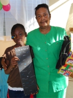 Orphan in the Bon Repos orphanage receiving their Make Jesus Smile shoeboxes 